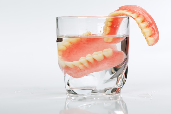 Tips For Comfort And Secure Attachment For New Dentures